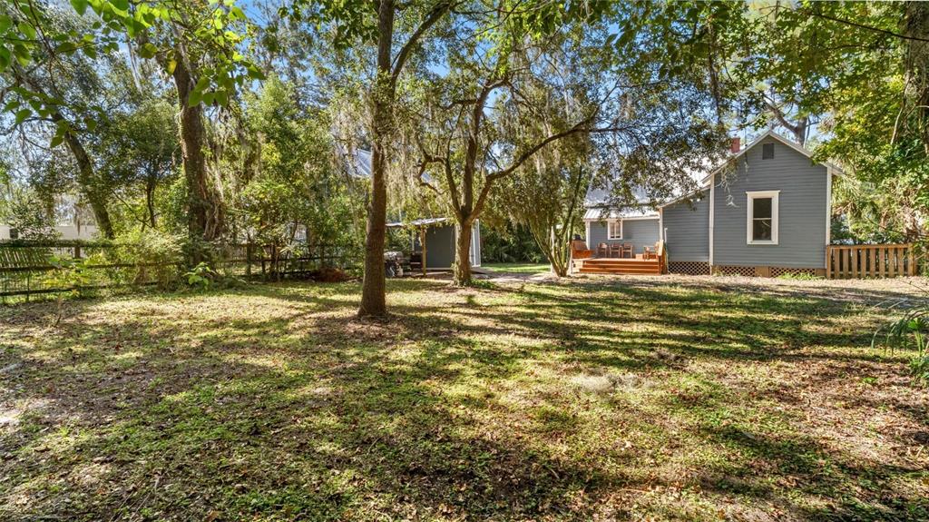 101 Northeast 9th Street Gainesville, FL 32601 - Photo 33 of 35 a front view of a house with a yard