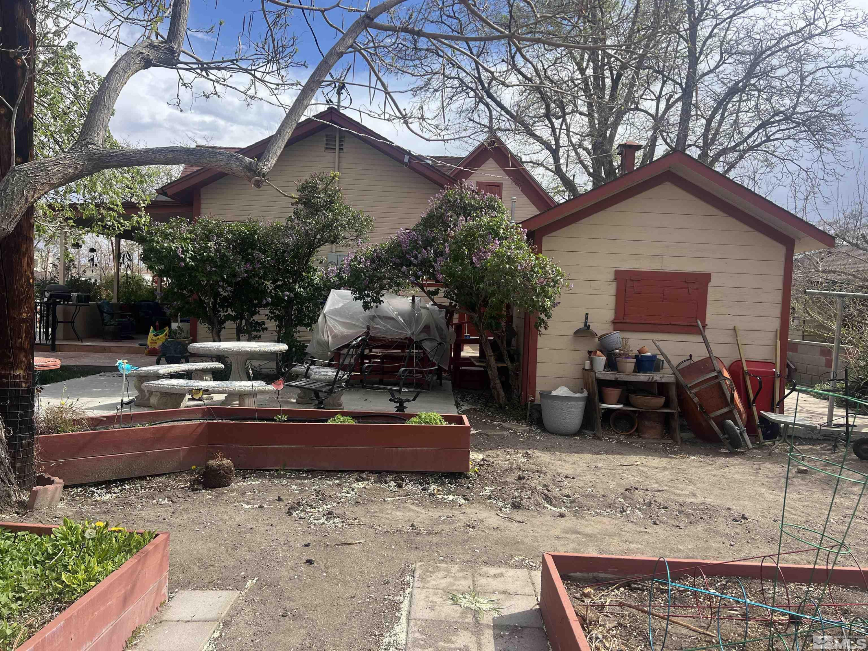 104 Virginia Street Yerington, NV 89447 - Photo 6 of 15 a view of a house with backyard