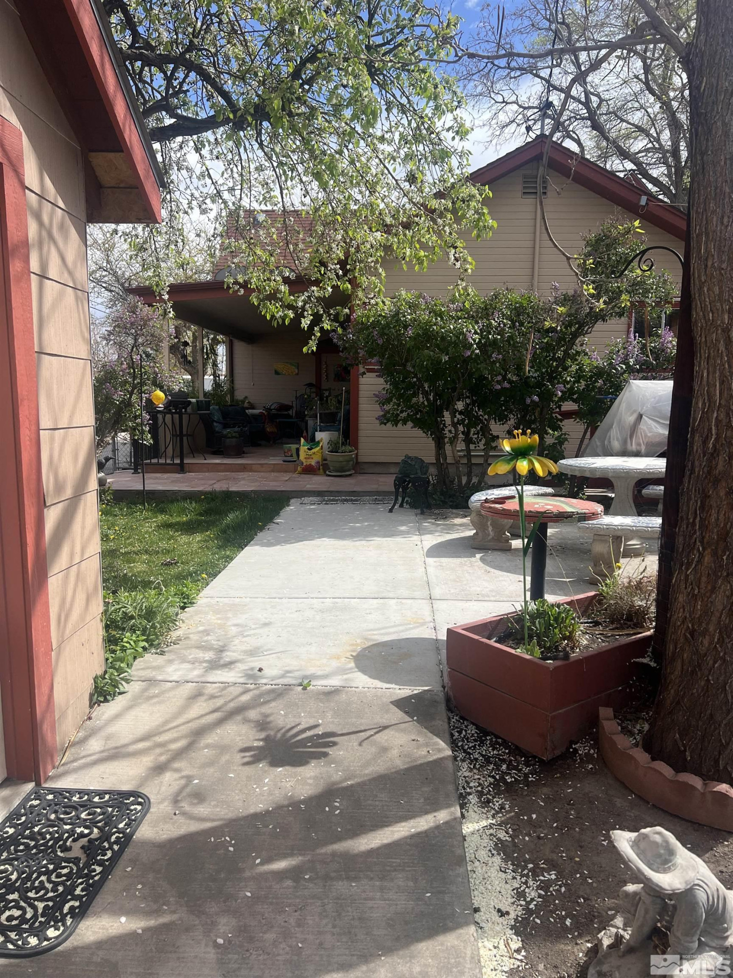 104 Virginia Street Yerington, NV 89447 - Photo 9 of 15 a view of a backyard with couches table and chairs