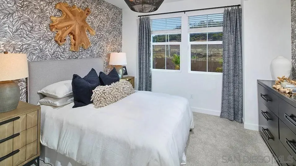 1212 Mountain Laurel Road San Marcos, CA 92078 - Photo 12 of 18 a bedroom with a bed and a window