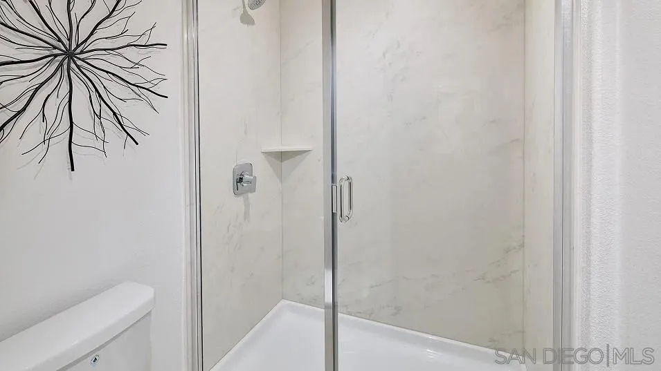 1212 Mountain Laurel Road San Marcos, CA 92078 - Photo 14 of 18 a bathroom with a granite countertop shower
