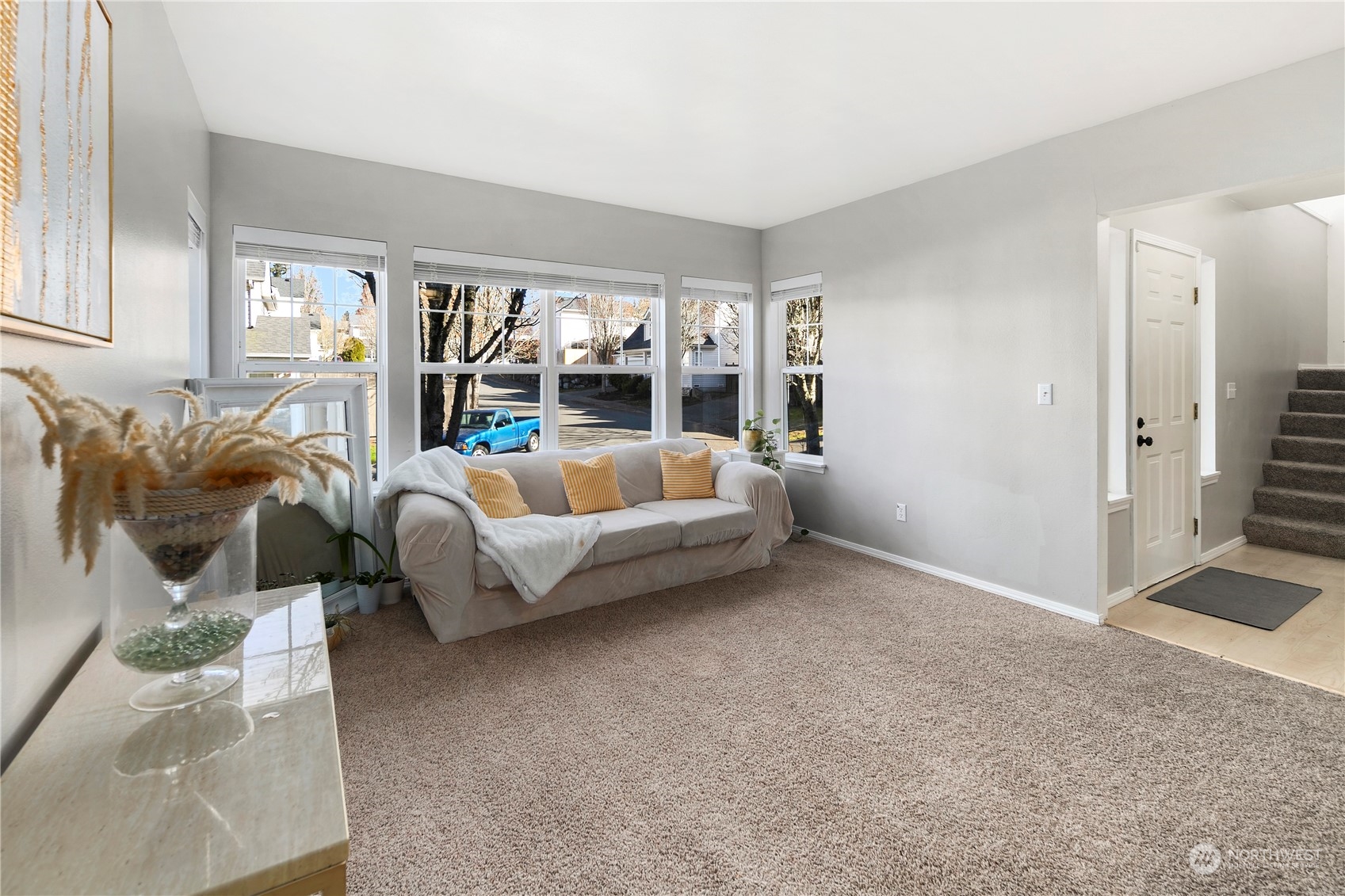 3919 Northeast 5th Street Renton, WA 98056 - Photo 6 of 37 a living room with furniture and a large window