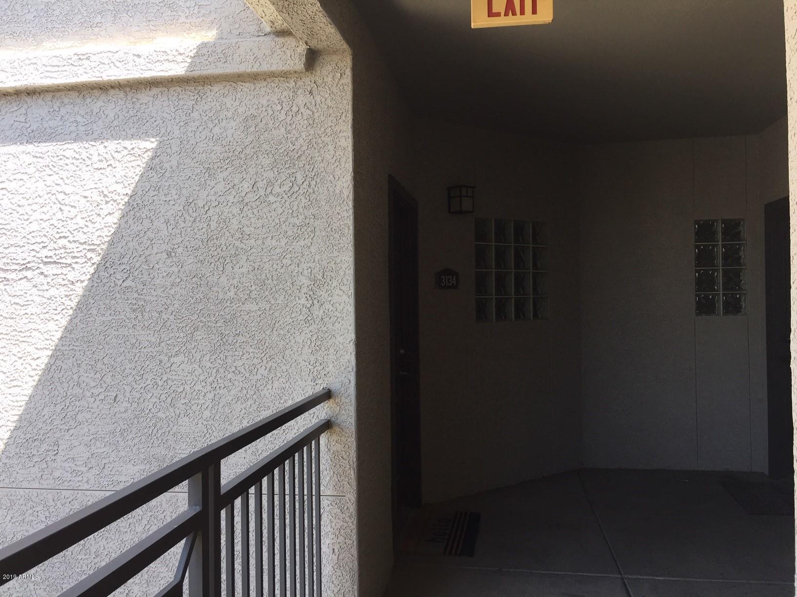 909 East Camelback Road, Unit 3134 Phoenix, AZ 85014 - Photo 9 of 17 Hallway Leading to Front Door