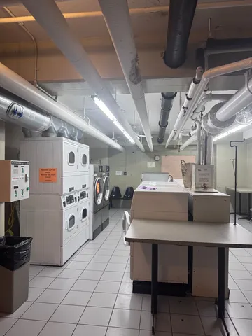 a view of a couches and dinning table in patio