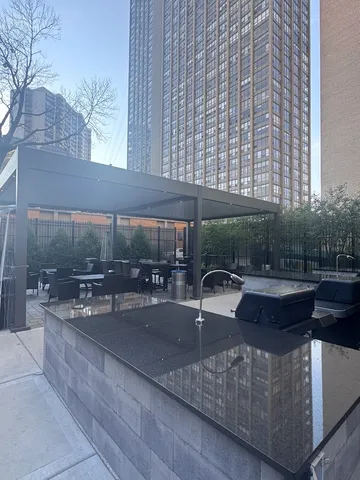 a view of a balcony with chairs