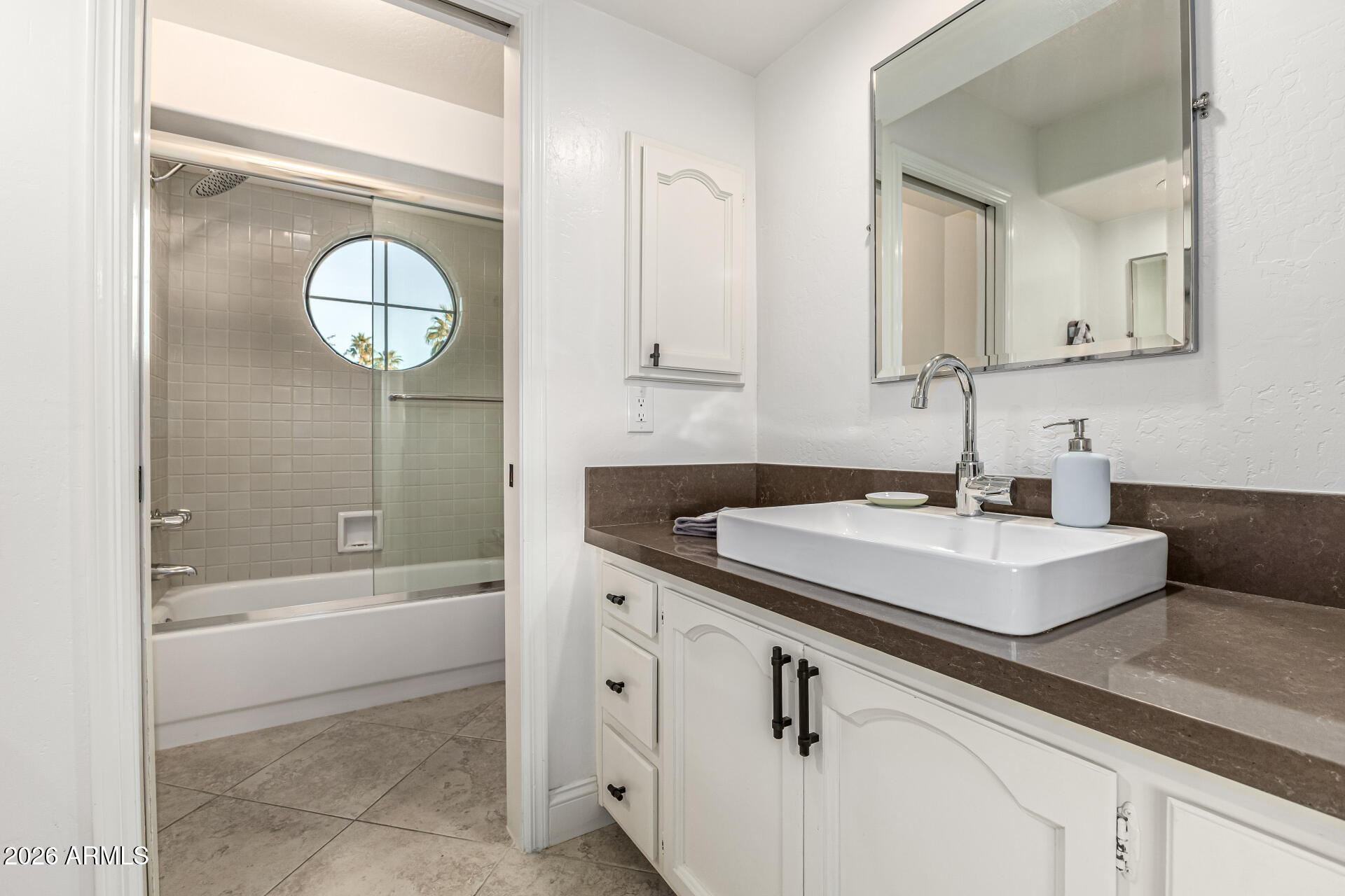 7955 East Chaparral Road, Unit 130 Scottsdale, AZ 85251 - Photo 25 of 38 Full bath with separate shower and bath