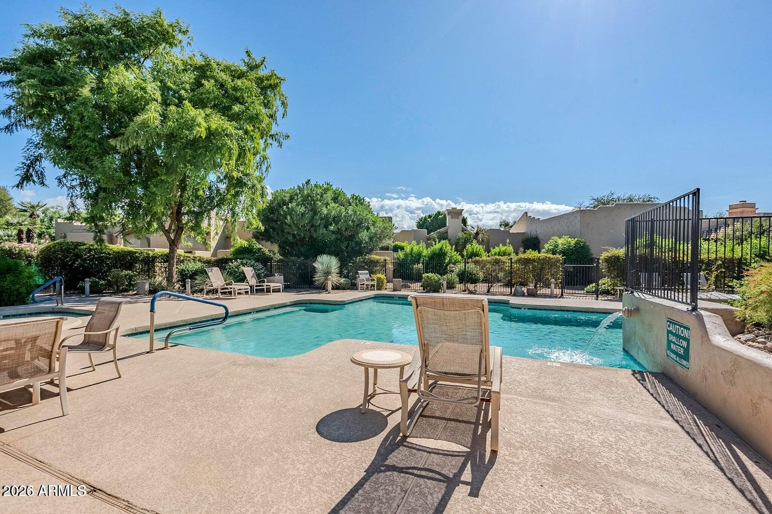 7955 East Chaparral Road, Unit 130 Scottsdale, AZ 85251 - Photo 37 of 38 community pool/spa