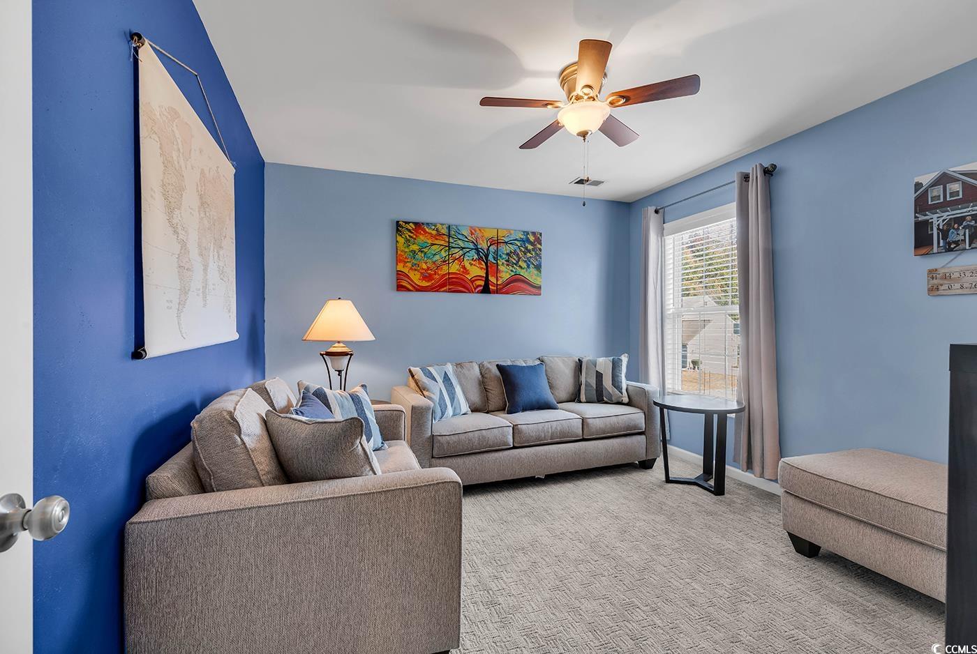 4337 Red Rooster Lane Myrtle Beach, SC 29579 - Photo 29 of 40 Living room with ceiling fan and light carpet