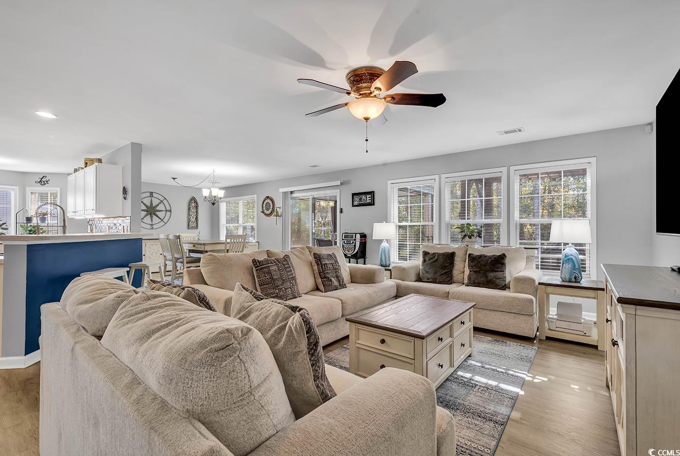 4337 Red Rooster Lane Myrtle Beach, SC 29579 - Photo 4 of 40 Living room featuring ceiling fan with notable cha