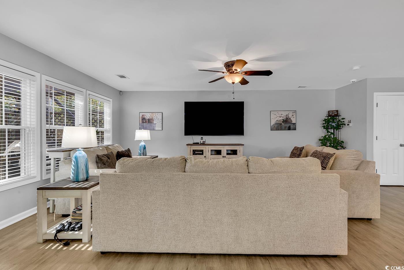 4337 Red Rooster Lane Myrtle Beach, SC 29579 - Photo 7 of 40 Living room featuring ceiling fan and light wood-t