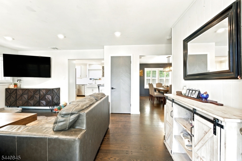 36 Forest Road Andover, NJ 07821 - Photo 47 of 50 a living room with furniture and a flat screen tv