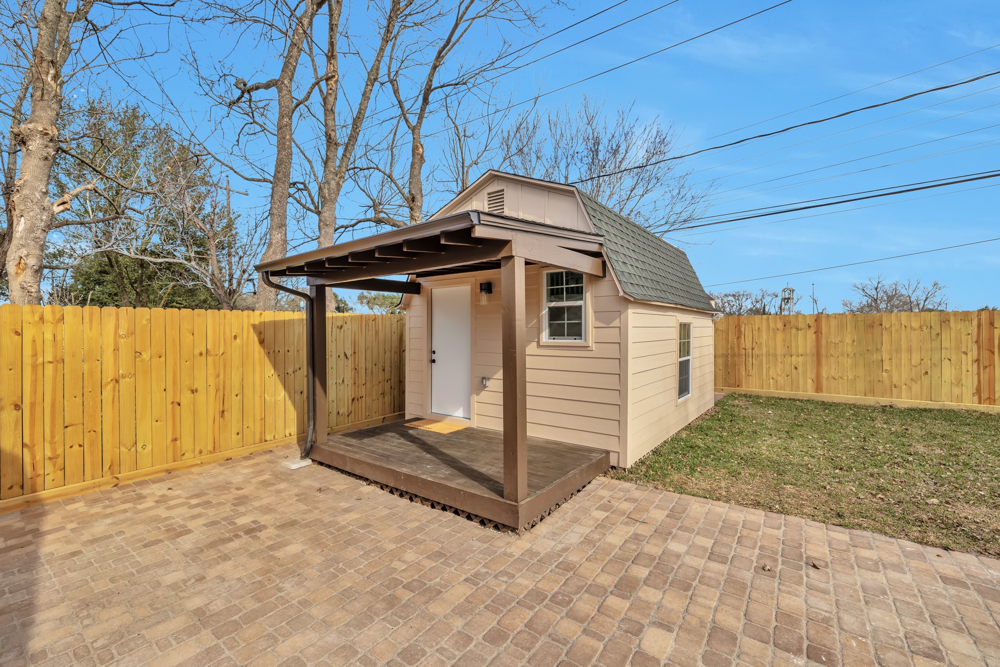 8709 Tarbell Road Houston, TX 77034 - Photo 20 of 25 a house with trees in the background