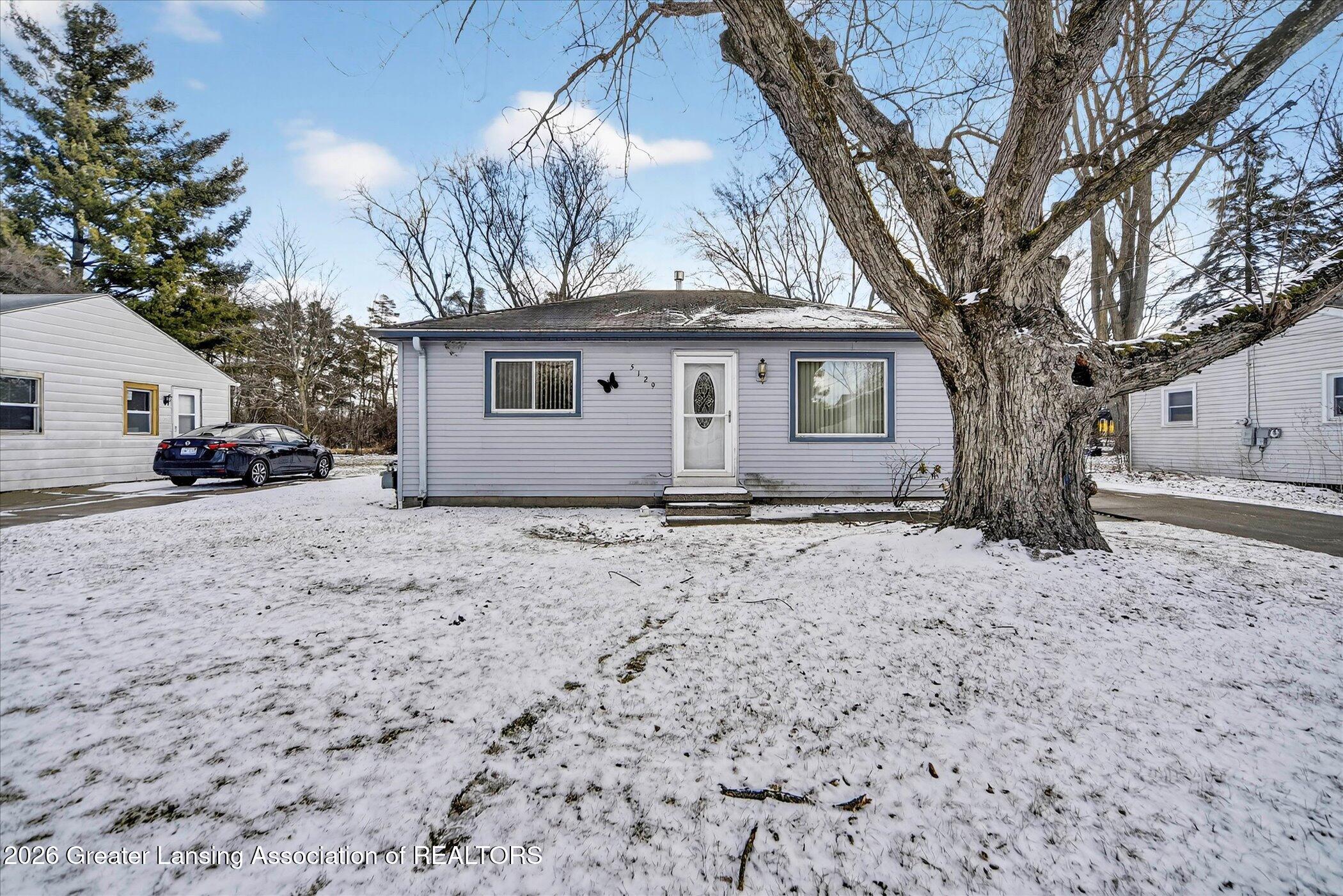 5129 Wexford Road Lansing, MI 48911 - Photo 3 of 24 03-5129-Wexford-Rd-Lansing-MI-48911-Wind