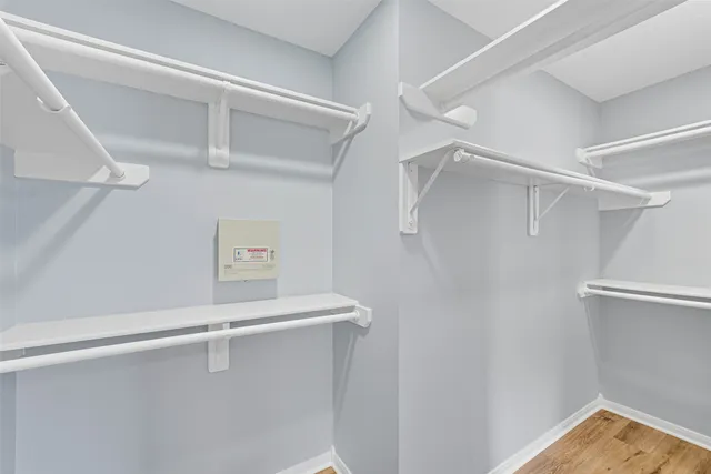 a view of an empty walk in closet