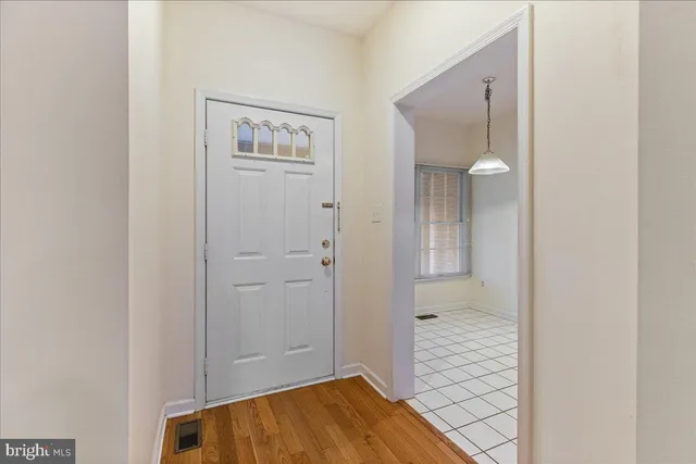 a view of bathroom with wooden floor