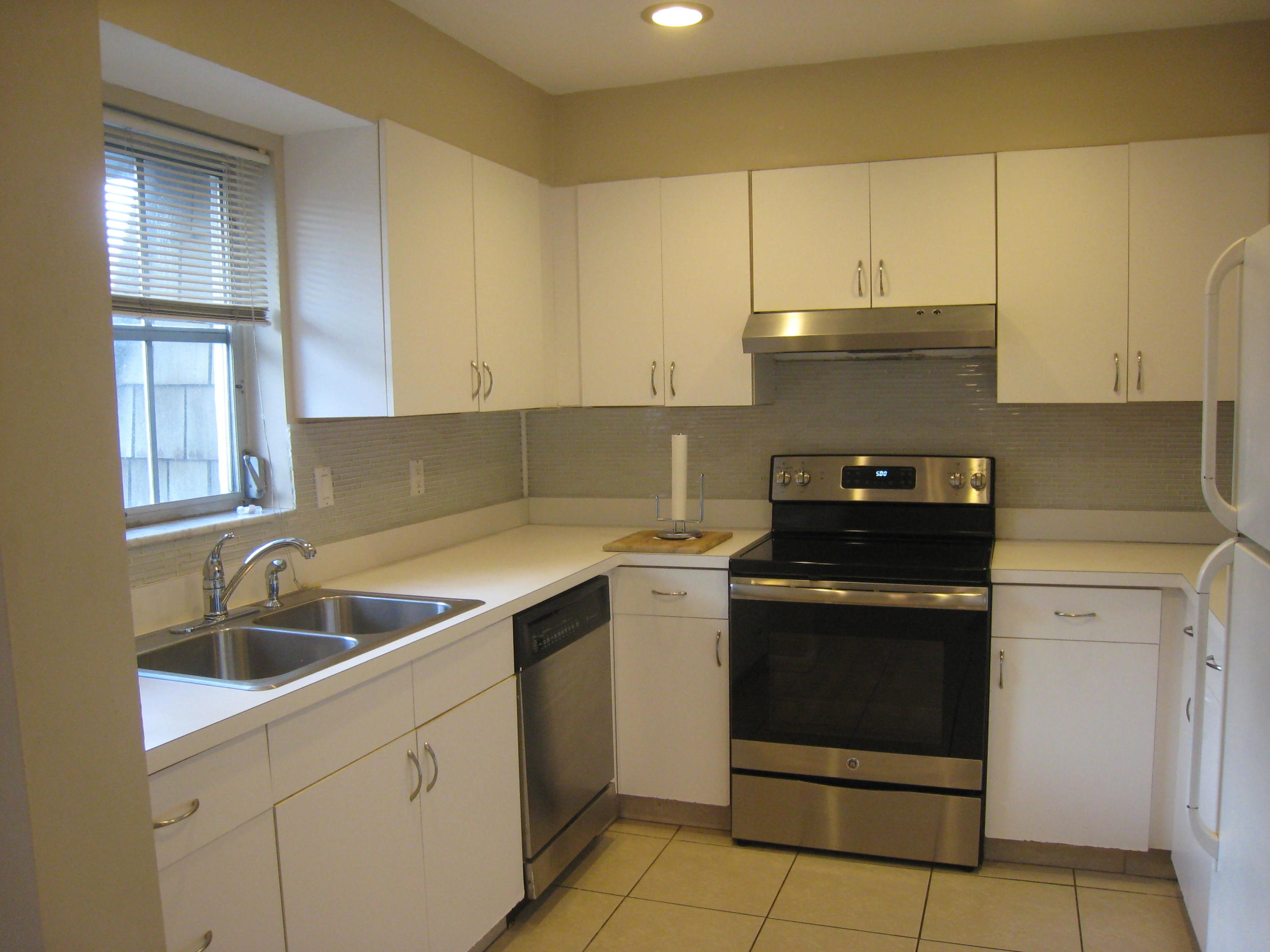 423 Pine Tree Court, Unit 23 Atlantis, FL 33462 - Photo 2 of 32 IMG_8726