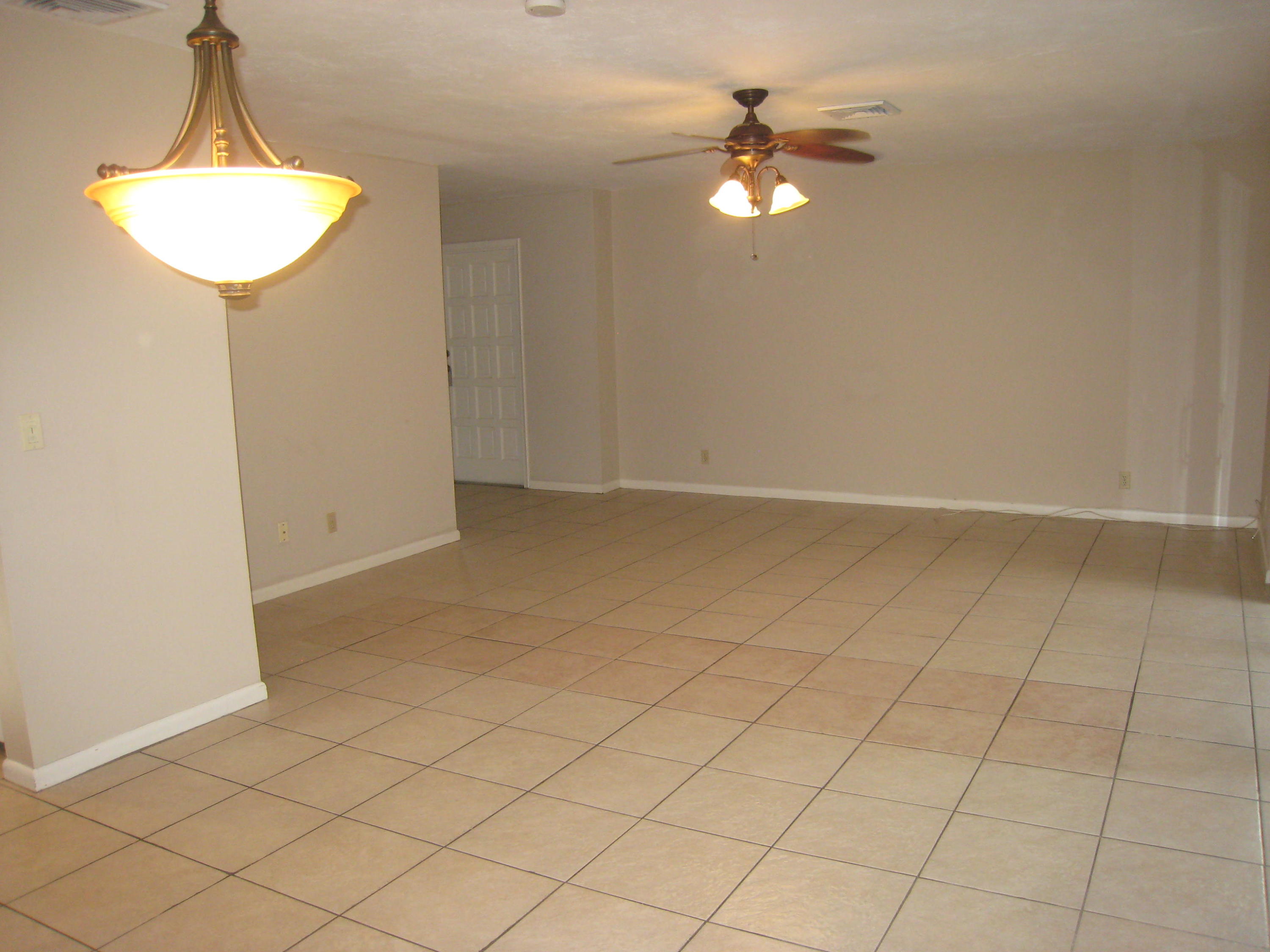 423 Pine Tree Court, Unit 23 Atlantis, FL 33462 - Photo 4 of 32 IMG_8729