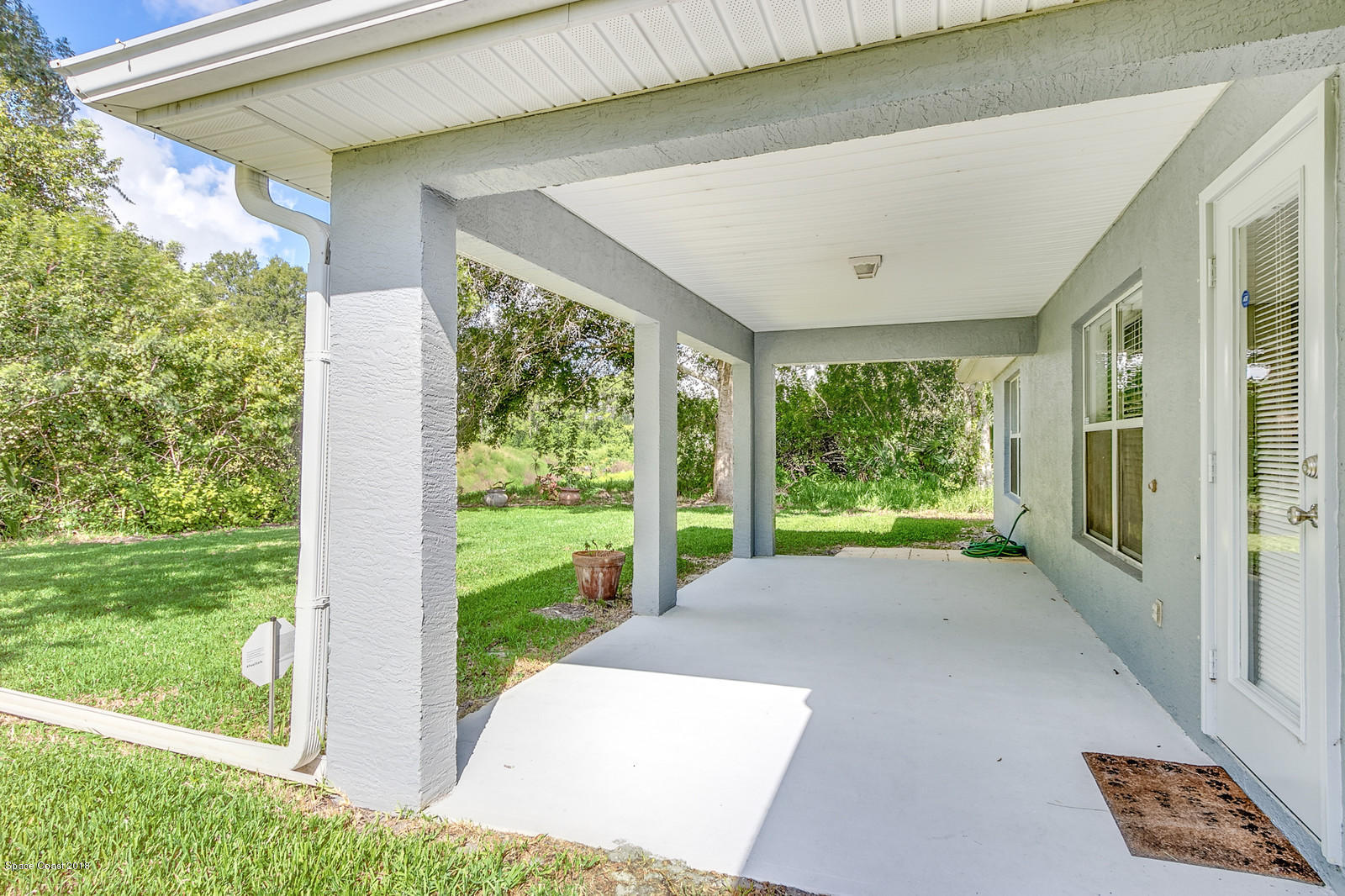 1166 Wabash Road Southeast Palm Bay, FL 32909 - Photo 23 of 27 Trussed Back Porch
