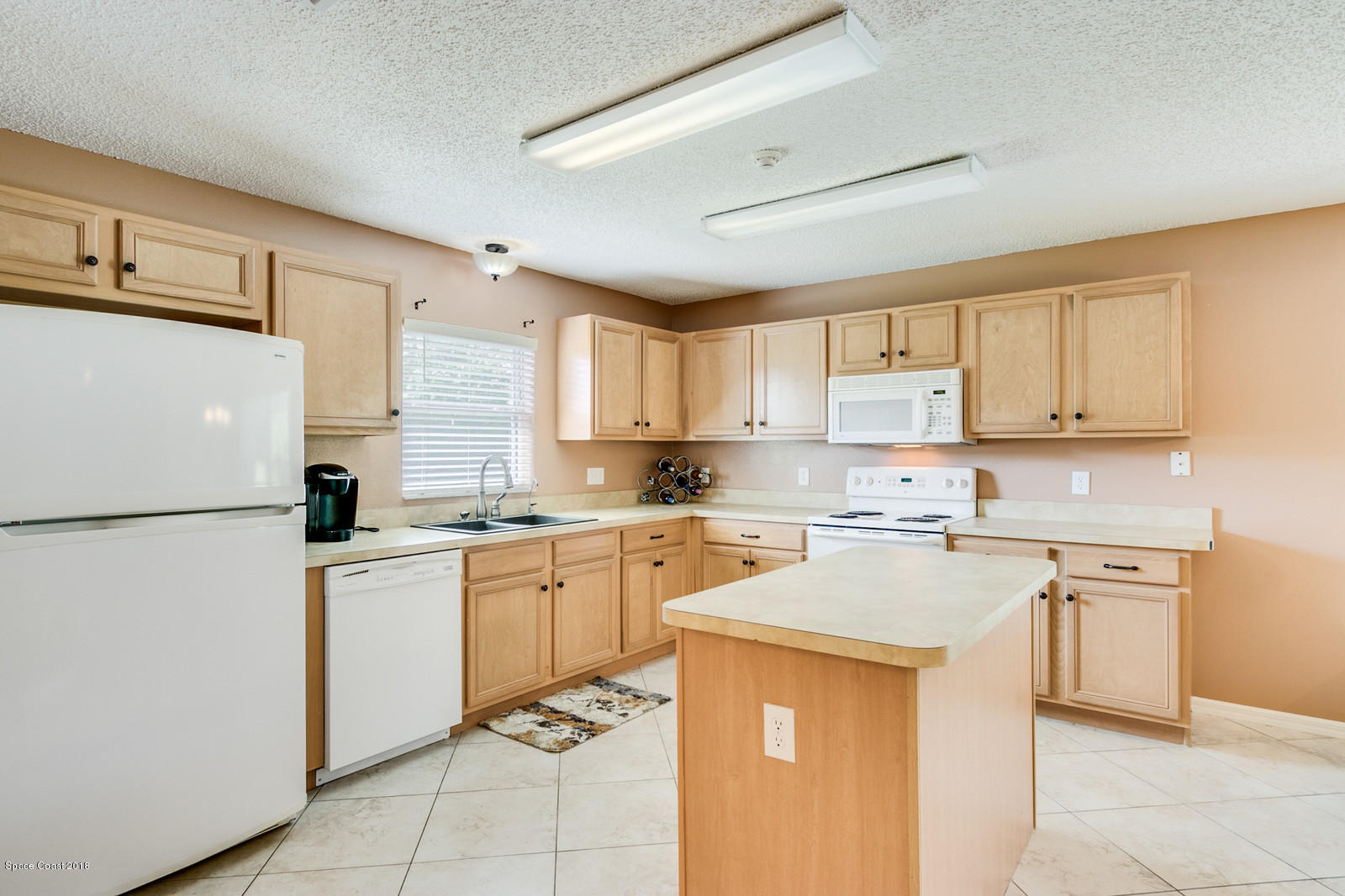 1166 Wabash Road Southeast Palm Bay, FL 32909 - Photo 8 of 27 Kitchen Island