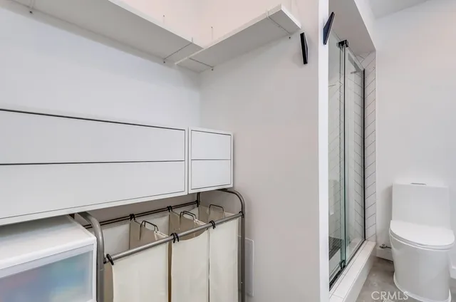 a en suite bathroom with a sink and a mirror