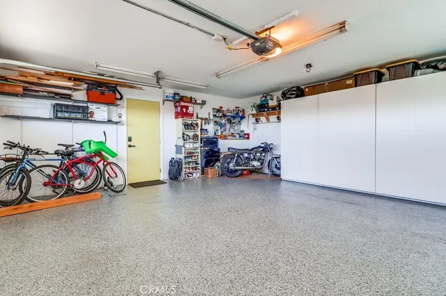 a view of a room with cabinet and windows