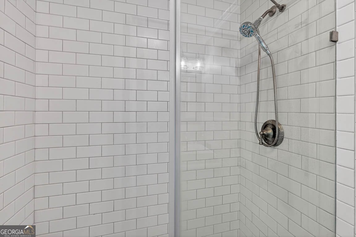 33 Warren Avenue Waverly, GA 31565 - Photo 13 of 63 a bathroom with a shower