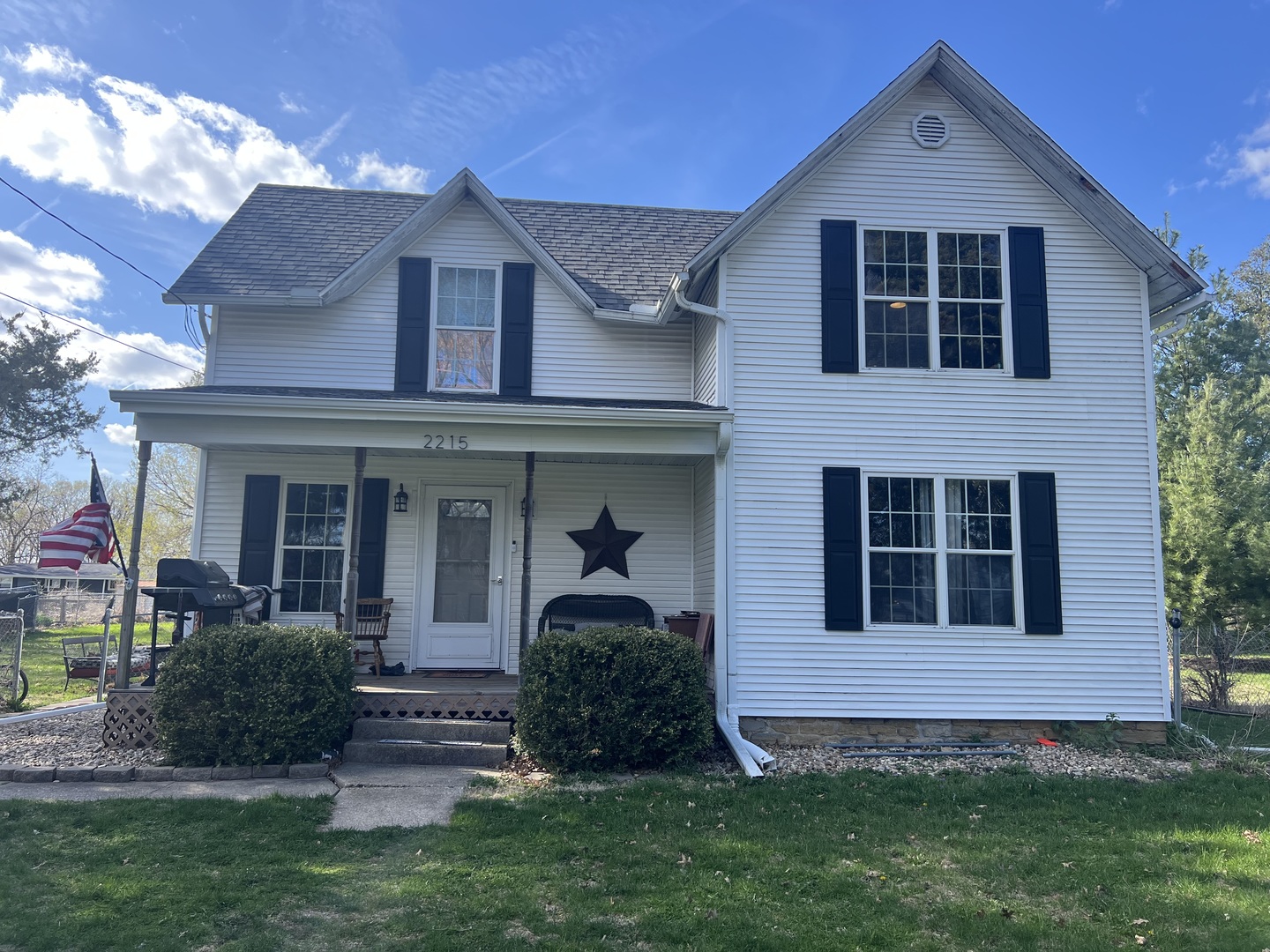2215 Deets Road Sterling, IL 61081 - Photo 1 of 12 a front view of a house with a yard
