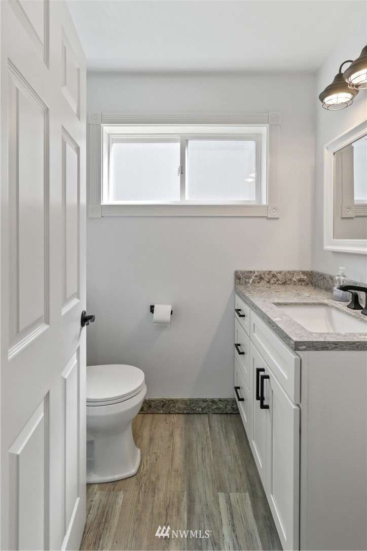 706 2nd Street Steilacoom, WA 98388 - Photo 15 of 35 a bathroom with a sink and a toilet