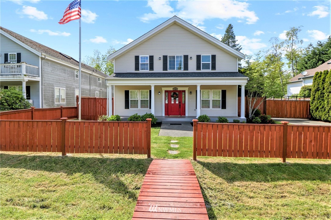 706 2nd Street Steilacoom, WA 98388 - Photo 3 of 35 a front view of a house with garden