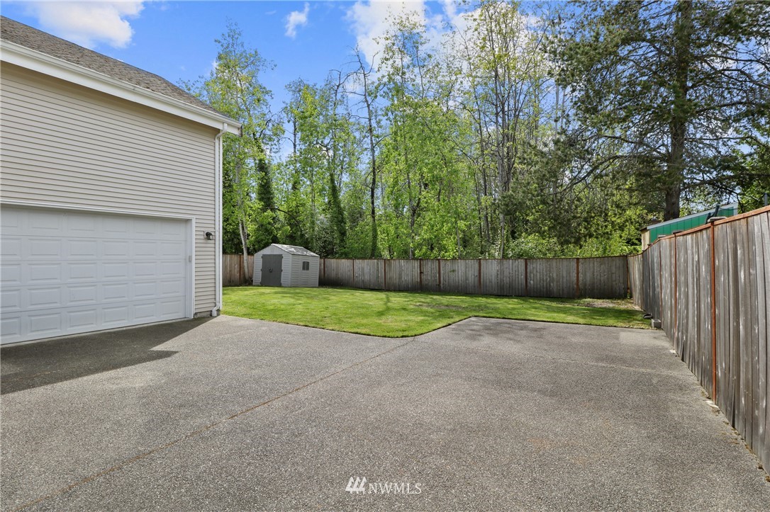 706 2nd Street Steilacoom, WA 98388 - Photo 31 of 35 a view of backyard and tree
