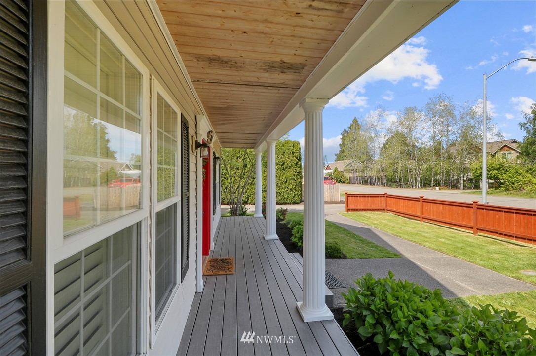 706 2nd Street Steilacoom, WA 98388 - Photo 5 of 35 a house view with a sitting space and garden view