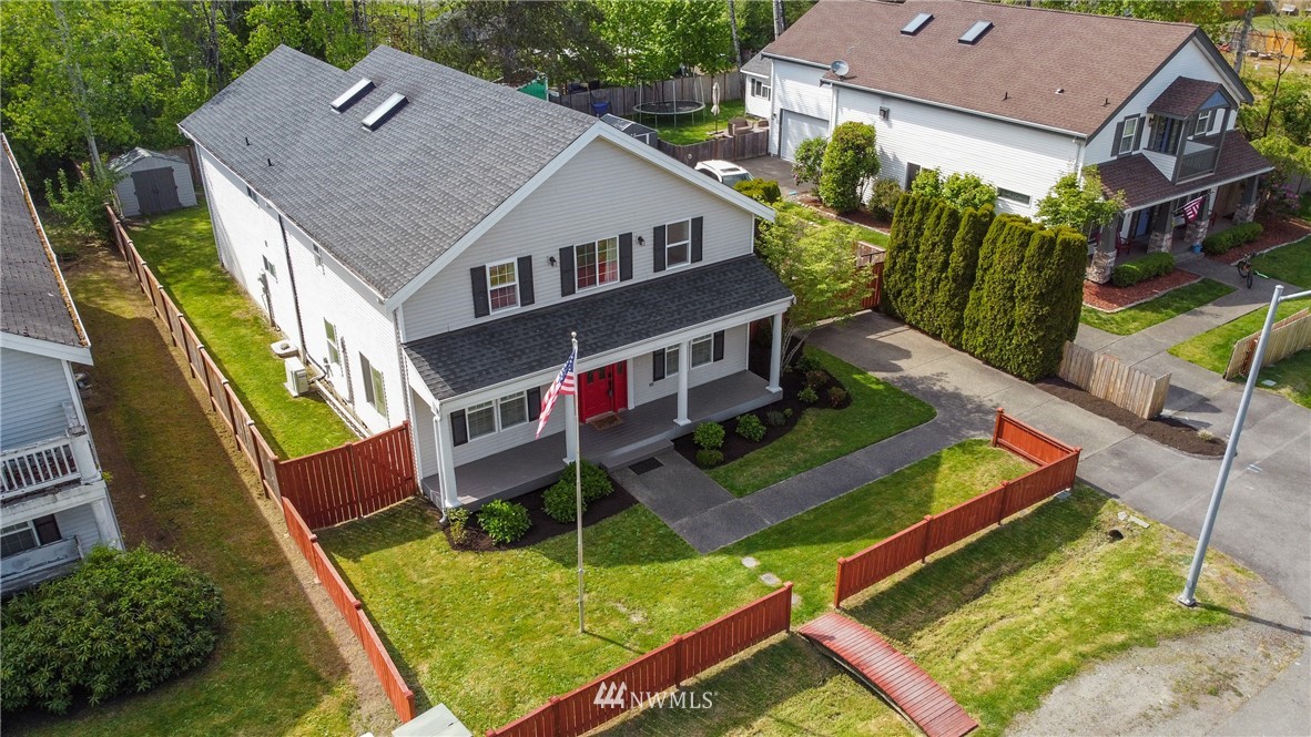 706 2nd Street Steilacoom, WA 98388 - Photo 6 of 35 an aerial view of a house