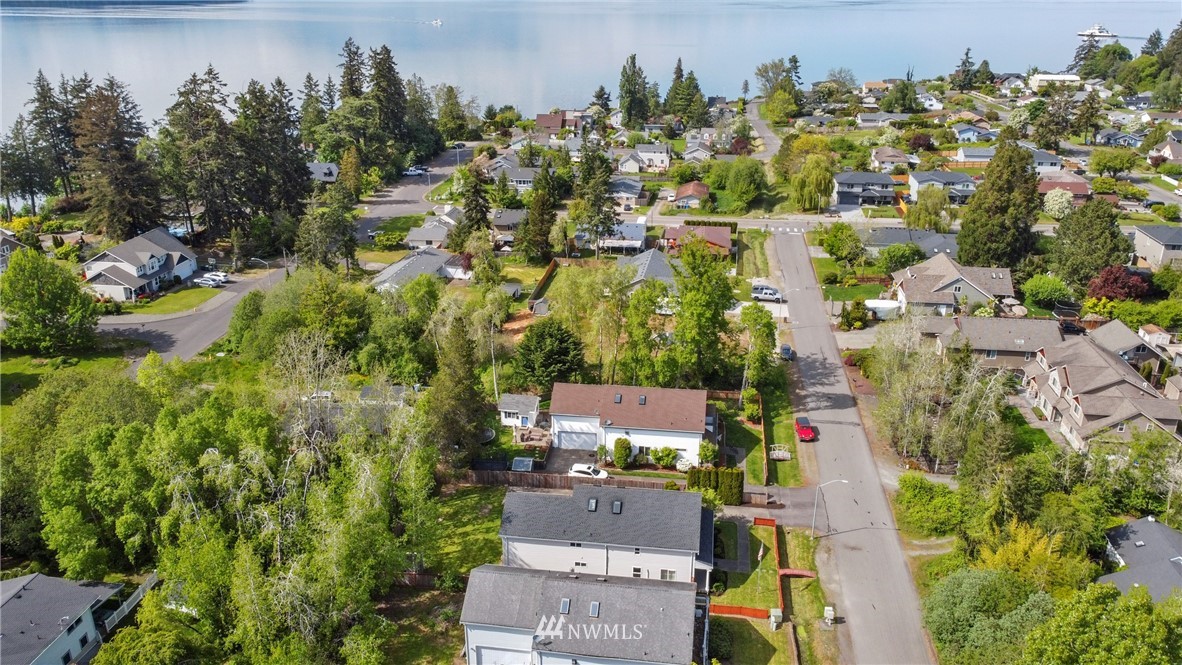 706 2nd Street Steilacoom, WA 98388 - Photo 7 of 35 an aerial view of residential houses with outdoor space