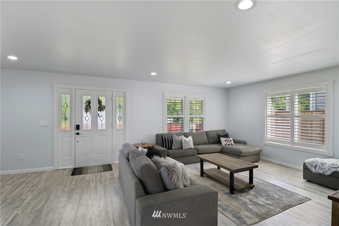 706 2nd Street Steilacoom, WA 98388 - Photo 8 of 35 a living room with furniture and wooden floor