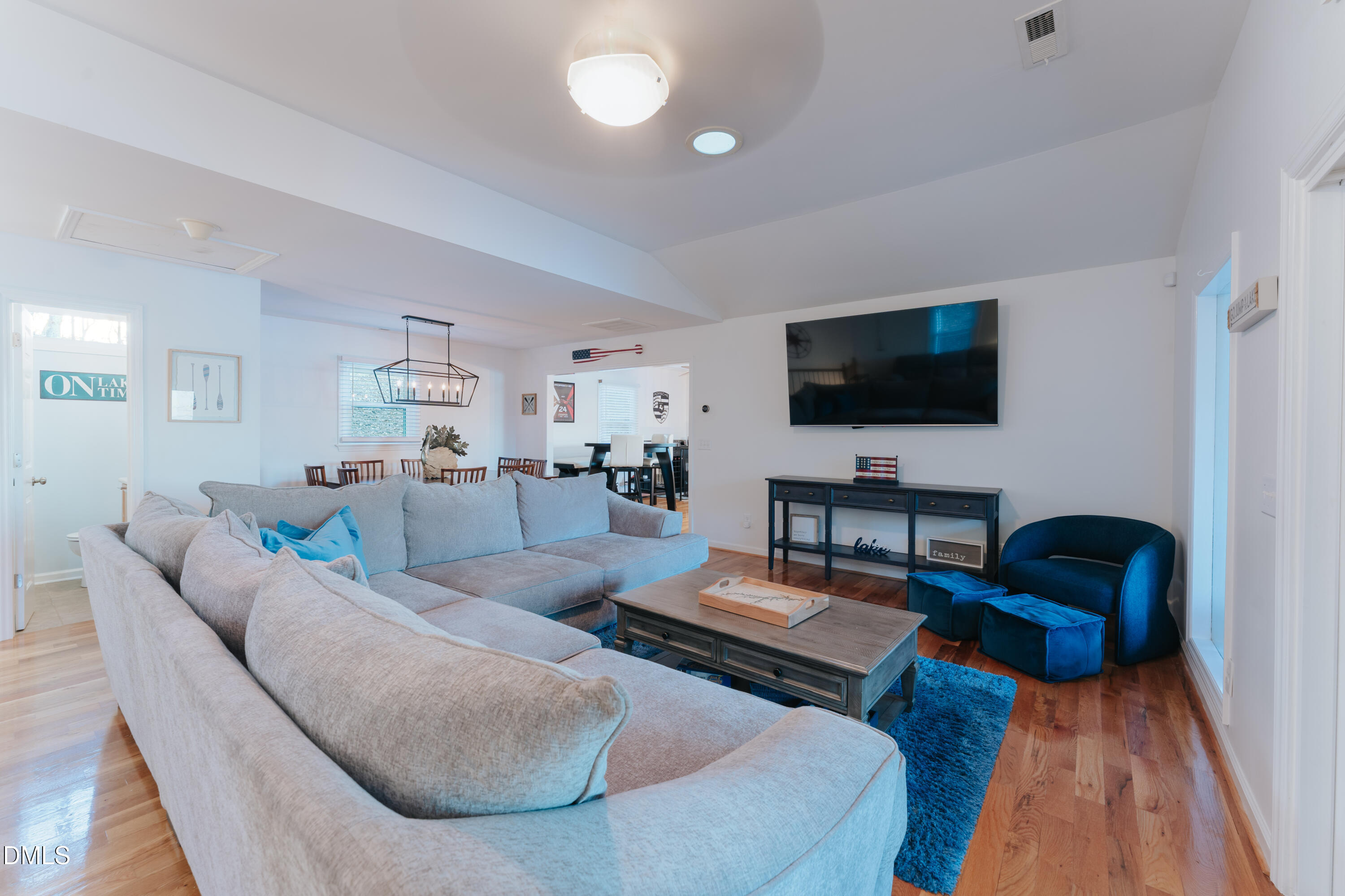 288 Bunny Rabbit Road Leasburg, NC 27291 - Photo 5 of 74 a living room with furniture and a flat screen tv