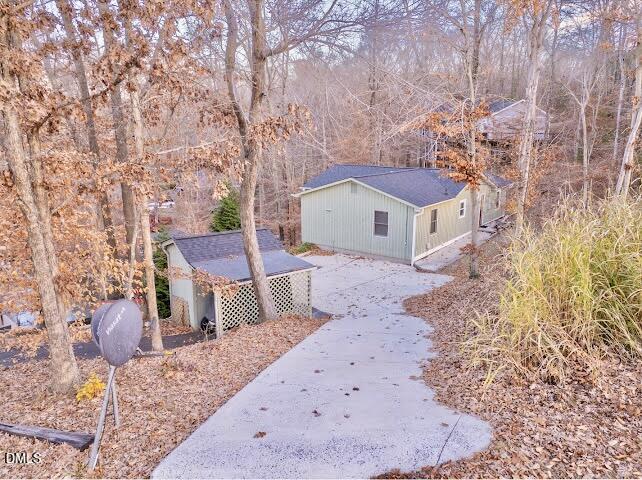 288 Bunny Rabbit Road Leasburg, NC 27291 - Photo 60 of 74 a view of a house with a yard