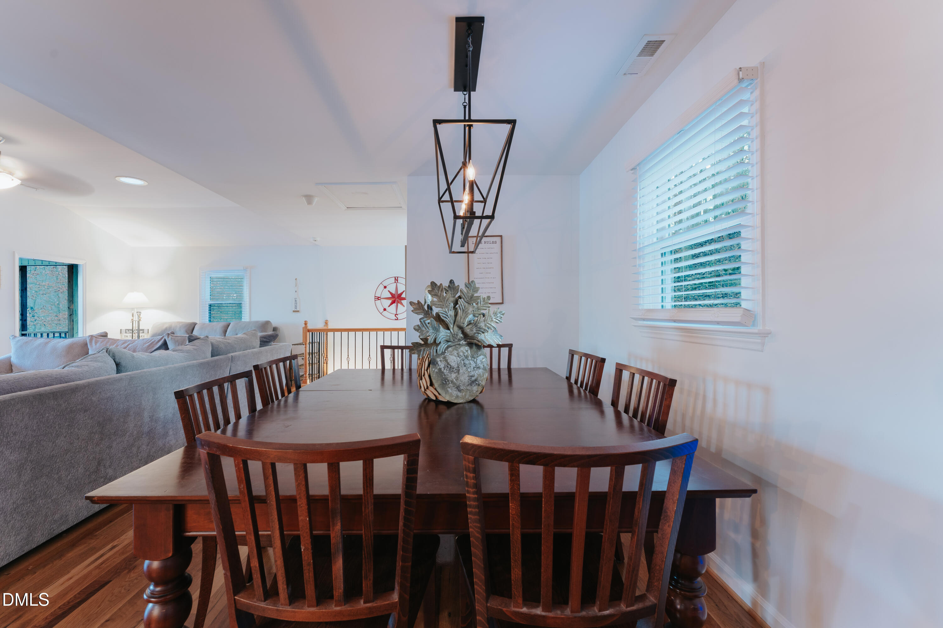 288 Bunny Rabbit Road Leasburg, NC 27291 - Photo 8 of 74 a view of a dining room with furniture window and wooden floor