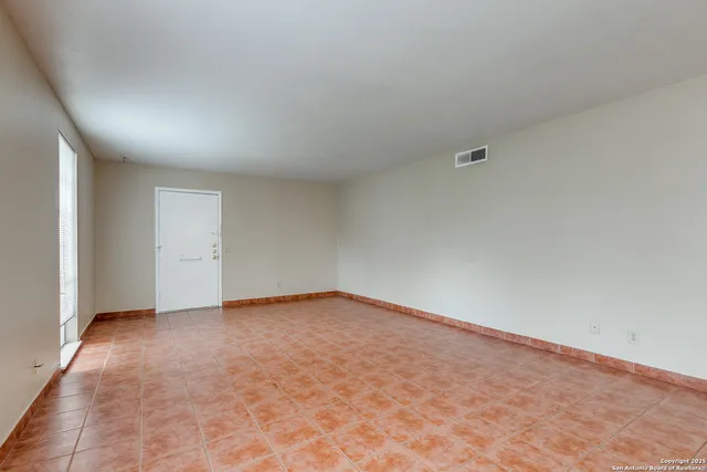 an empty room with an entryway