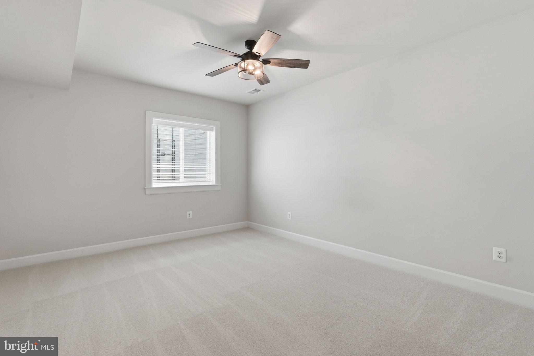 23648 Amesfield Place Aldie, VA 20105 - Photo 17 of 41 an empty room with a window