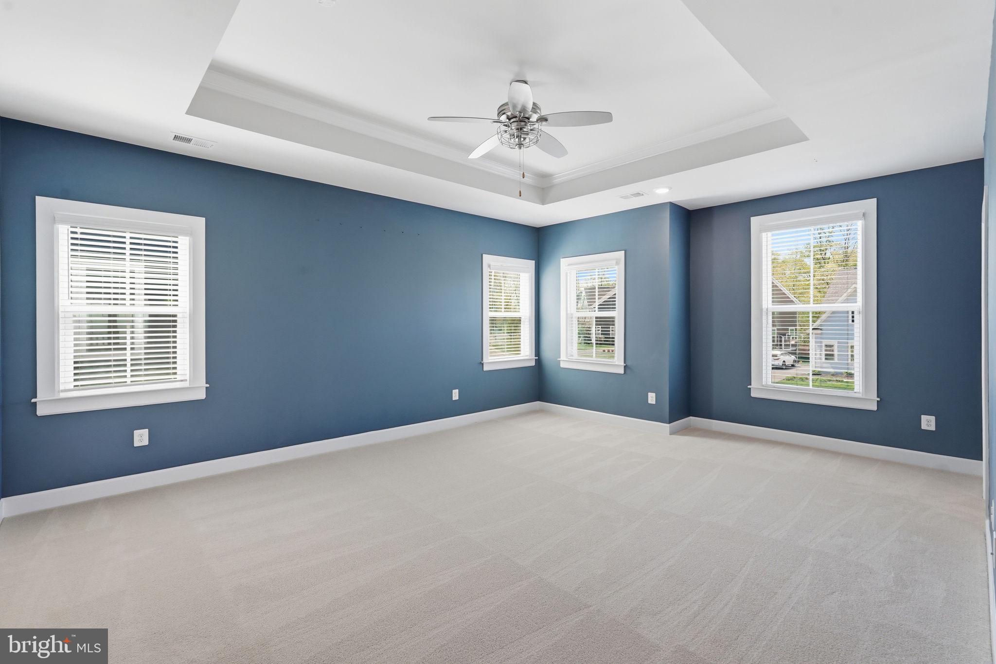 23648 Amesfield Place Aldie, VA 20105 - Photo 18 of 41 a view of a livingroom with a ceiling fan and window