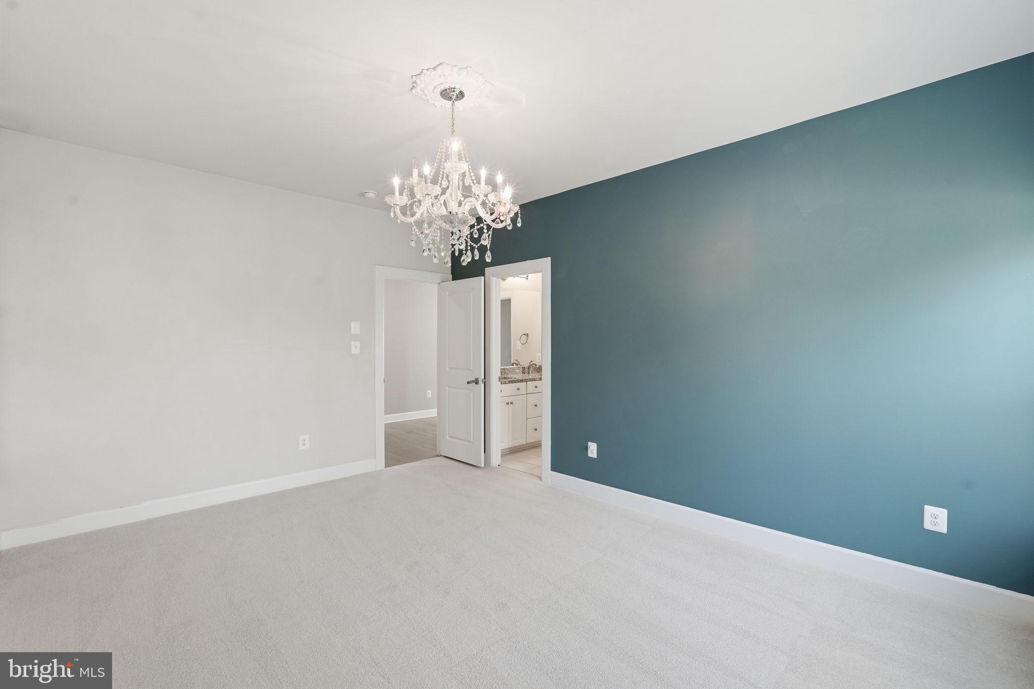 23648 Amesfield Place Aldie, VA 20105 - Photo 23 of 41 a view of a chandelier in big room and chandelier