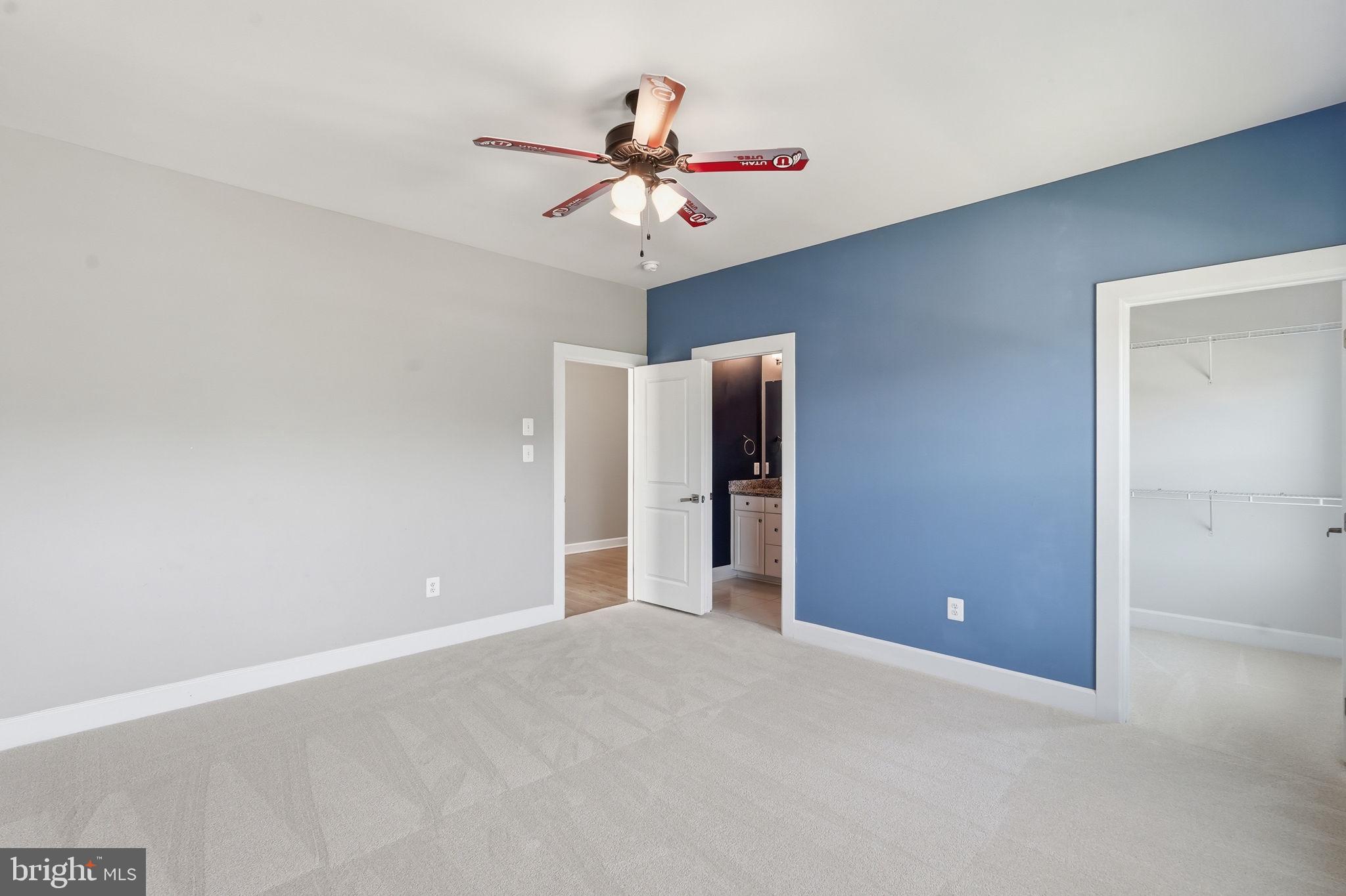 23648 Amesfield Place Aldie, VA 20105 - Photo 27 of 41 a view of a livingroom with a ceiling fan and window