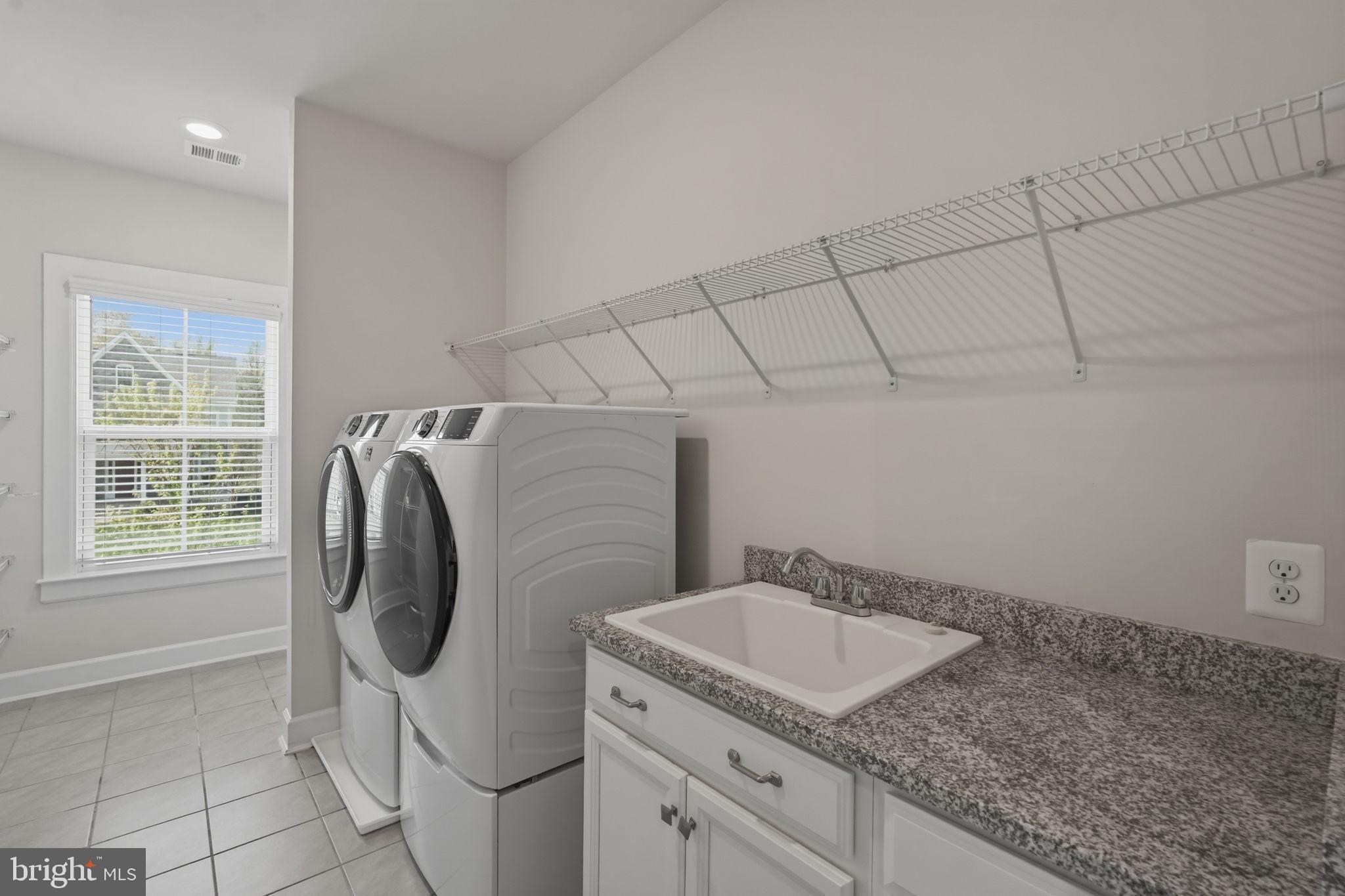 23648 Amesfield Place Aldie, VA 20105 - Photo 35 of 41 a utility room with dryer and washer