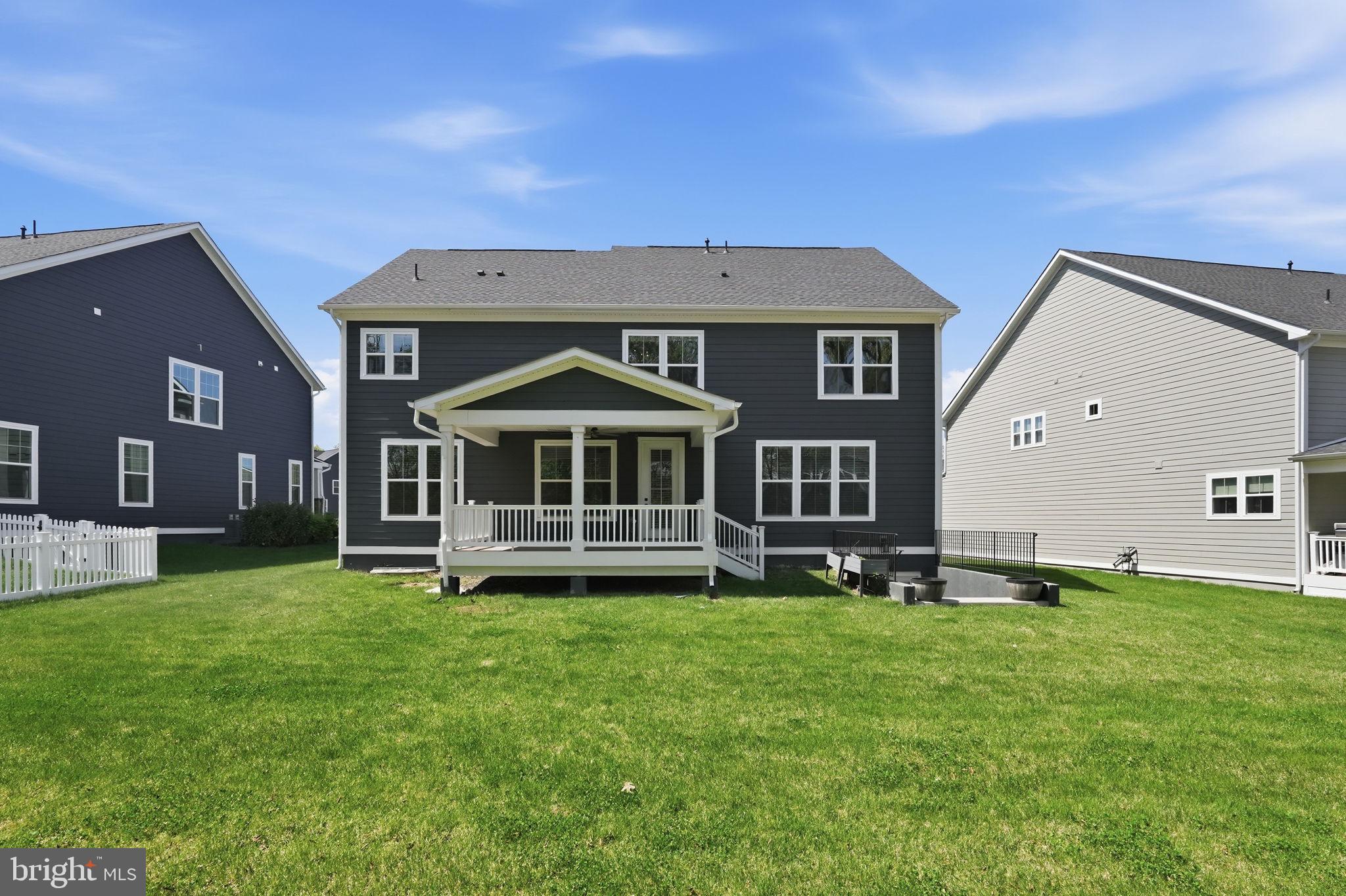 23648 Amesfield Place Aldie, VA 20105 - Photo 40 of 41 a front view of a house with a garden