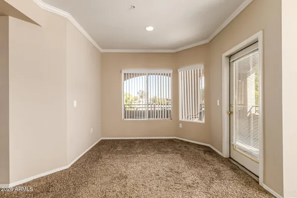 a big room with windows and closet