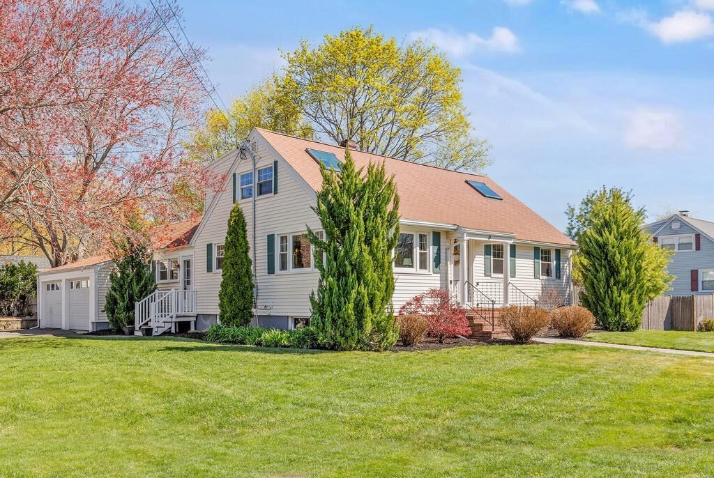 4 Crescent Road Hamilton, MA 01982 - Photo 1 of 29 a front view of house with yard and trees