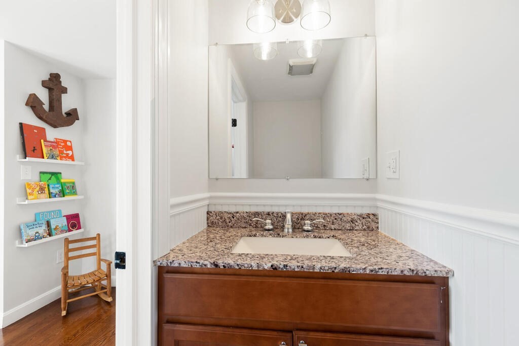 4 Crescent Road Hamilton, MA 01982 - Photo 15 of 29 a bathroom with a granite countertop sink and a mirror