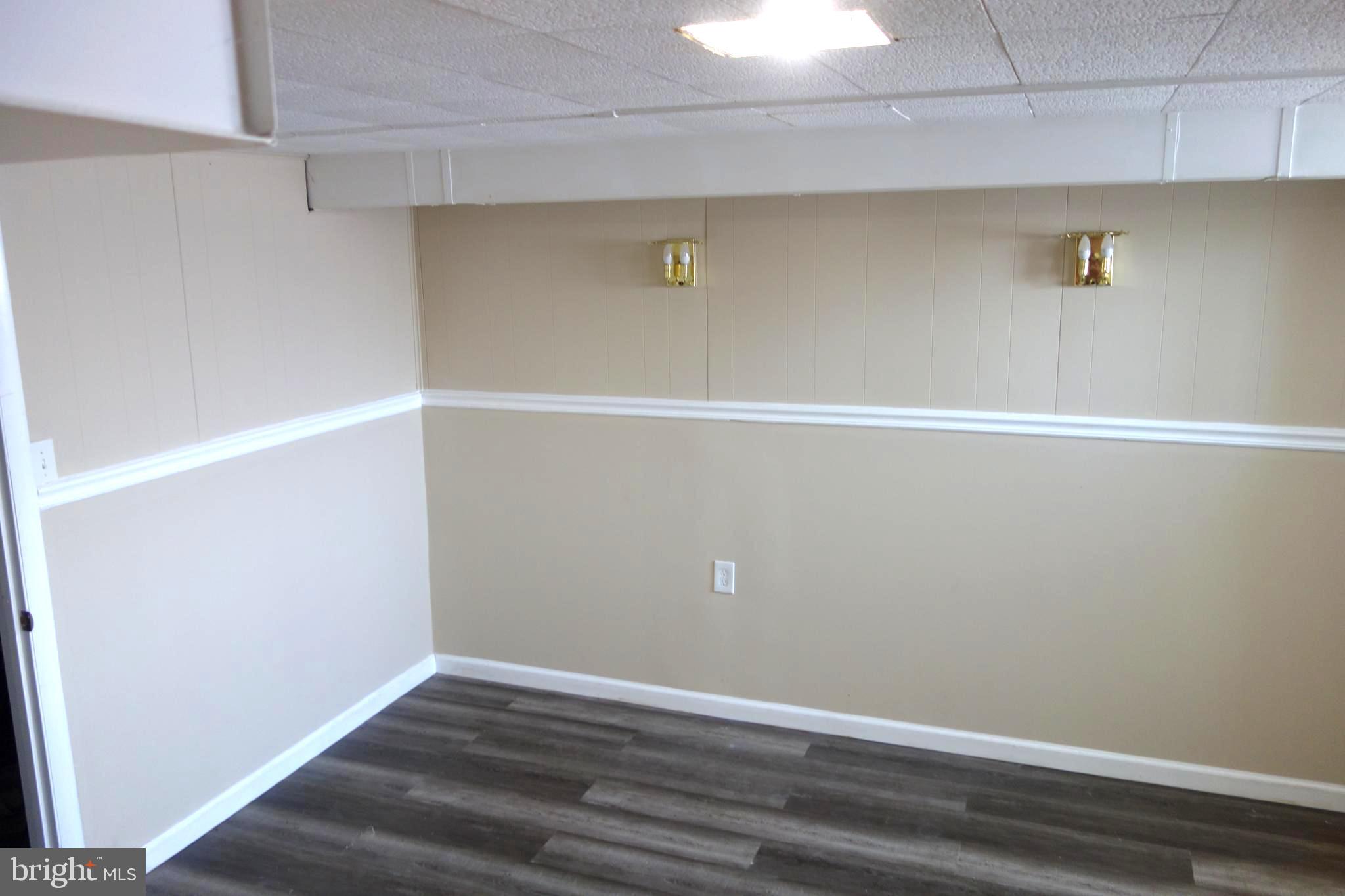 586 Lucia Avenue Baltimore, MD 21229 - Photo 13 of 14 a view of an empty room