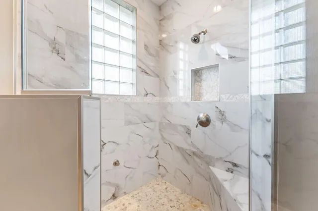 a view of a swimming pool with a patio