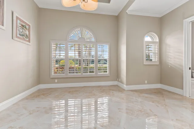 an aerial view of a house with yard swimming pool and outdoor seating